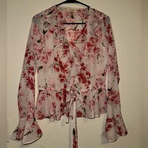 NWOT. Sheer blouse with tie detail. Size medium